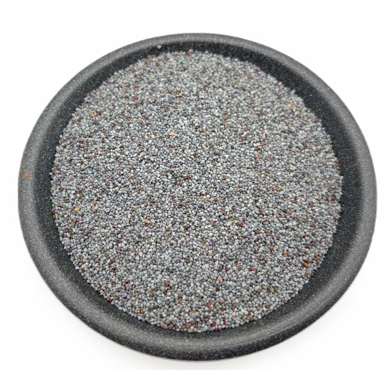 Blue poppy seeds in a dark bowl